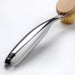 Close-up of IKEA VÄLVÅRDAD dish brush round head with natural agave leaf fibre bristles and wooden handle