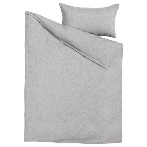 Digital Shoppy IKEA VÄSTKUSTROS bedding set in dark grey/white, including a 150x200 cm duvet cover and 50x80 cm pillowcase, on a neatly made bed 80500621