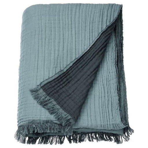 VALLKRASSING Throw adding warmth and style to a living space