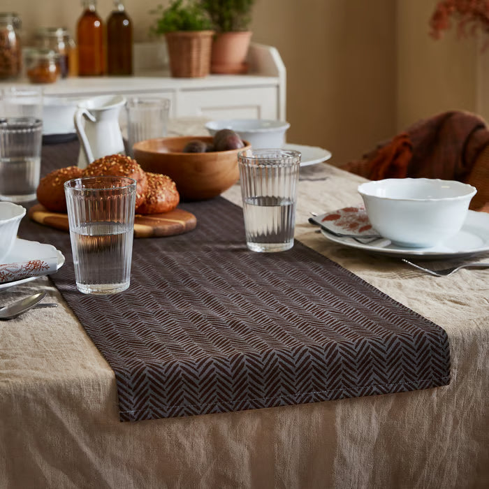 IKEA VARDAGEN clear glasses on a rustic dining table set with wooden bowl, bread and beige tablecloth