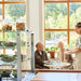 IKEA VARDAGEN glass jar with cookies displayed in café lifestyle setting