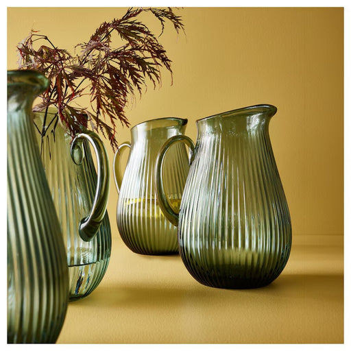 "IKEA VARDAGEN jug in dark grey-green, featuring an elegant pattern for decorative use.-00576653

