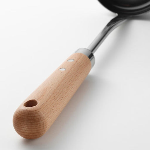 Close-up of stainless steel ladle with natural beech wood handle, VARDAGEN collection