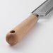 Close-up of VARDAGEN zester with stainless steel blade and beech handle, 33 cm, showing its elegant design
70581482