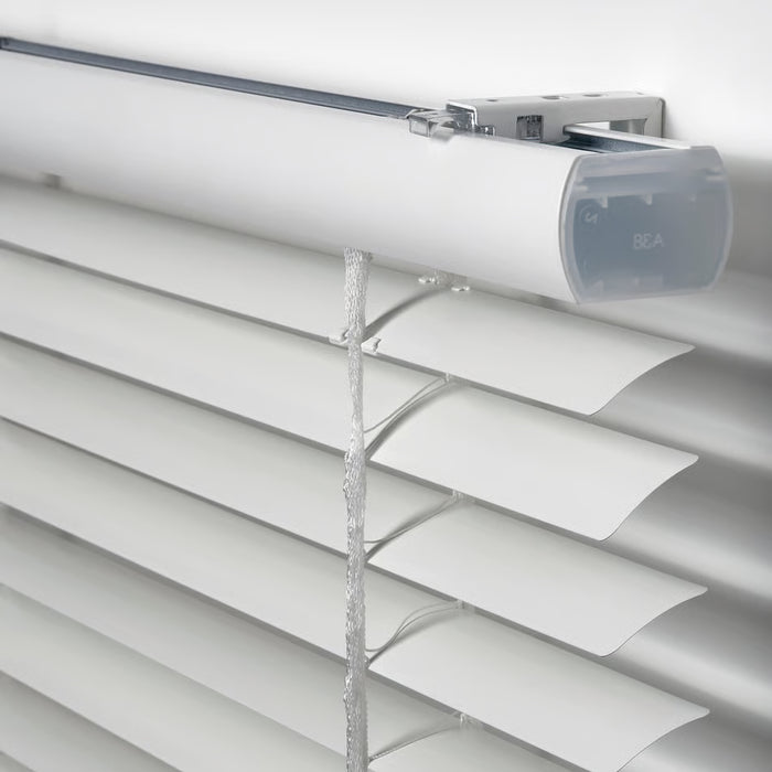  Person adjusting IKEA VECKLARFLY venetian blind using tilt wand to control light and privacy