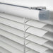  Person adjusting IKEA VECKLARFLY venetian blind using tilt wand to control light and privacy