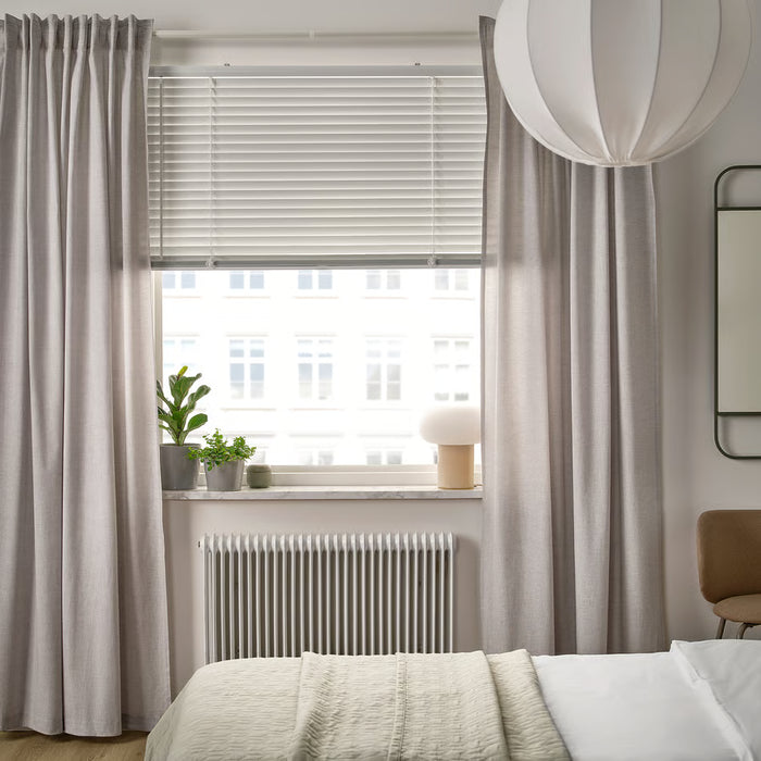  IKEA VECKLARFLY white venetian blind styled in bright contemporary room with natural light