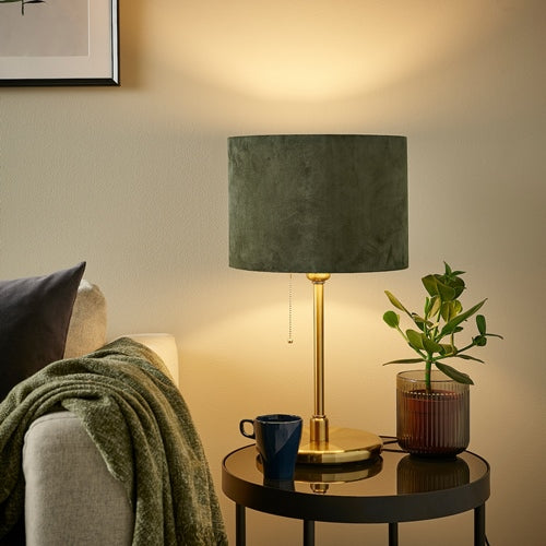 IKEA MOLNSKIKT dark green velvet lamp shade displayed on a modern lamp