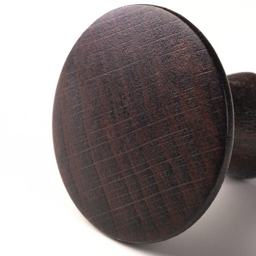 Two IKEA VINNÄSET brown mushroom-shaped solid beech knobs one upright one side-lying pair view