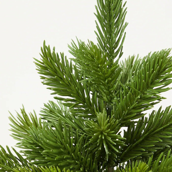 Close-up of the VINTERFINT artificial Christmas tree, green, 26 cm 80585899