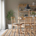 IKEA VIPPÄRT beige chair pads styled on dining chairs in cosy room with pendant light and plant
