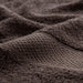 Close-up of folded IKEA VITBACKEN bath towel showing thick, soft cotton terry weave