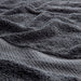 Close-up of IKEA VITBACKEN grey cotton bath towel showing soft, textured, absorbent surface