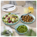  IKEA VITBLECKA turquoise plates styled on dining table with food including salad and meatballs