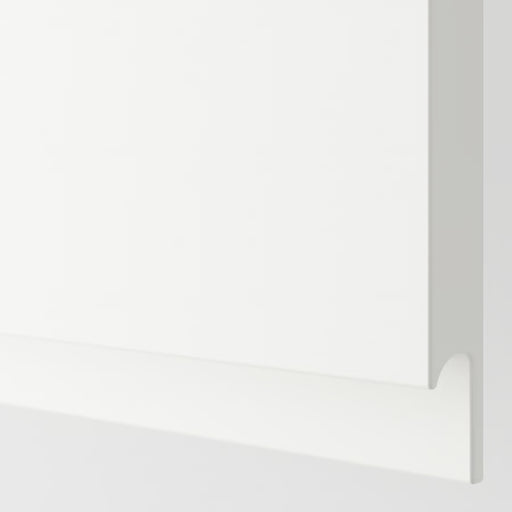 IKEA VOXTORP matt white cabinet door smooth matte finish close-up showing integrated handleless design