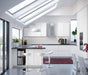 IKEA VOXTORP matt white doors installed in modern minimalist white kitchen with bar stools and skylights