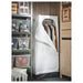 IKEA VUKU white wardrobe styled in a bedroom with clothes hanging inside compact footprint