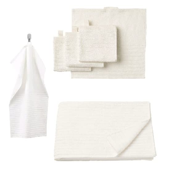 A white -Turquoise.bath towel from the Ikea 6 Piece Combo Set, folded neatly on towel rack.