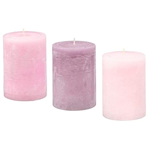A scented block candle from IKEA, adding a touch of elegance to your home decor with its charming design and pleasant aroma.