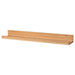 Digital Shoppy IKEA Picture ledge, bamboo, 75 cm (29 1/2 "), An image of a 75 cm bamboo picture ledge from IKEA, mounted on a wall and displaying a collection of framed photographs and decorative items.  40446344