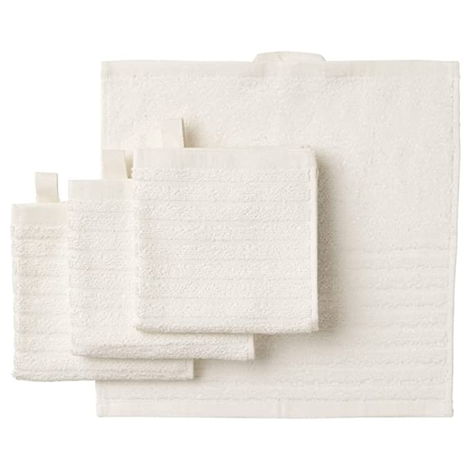 A white  wash cloth from the Ikea 6 Piece Combo Set, draped over a white bathtub.