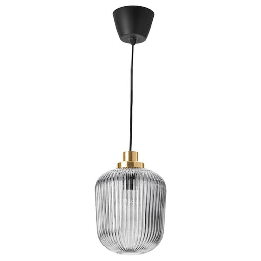 A collection of trendy IKEA pendant lamps in various shapes and sizes displayed in a home decor store