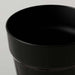 A plant pot with a glossy surface and rounded corners.