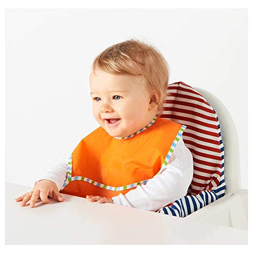 A smiling baby wearing an IKEA bib with the text "IKEA Bib: Easy-to-Clean and Durable 30179751