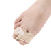 A side view of the toe separator, showing the thickness of the gel and the way it conforms to the shape of the foot.