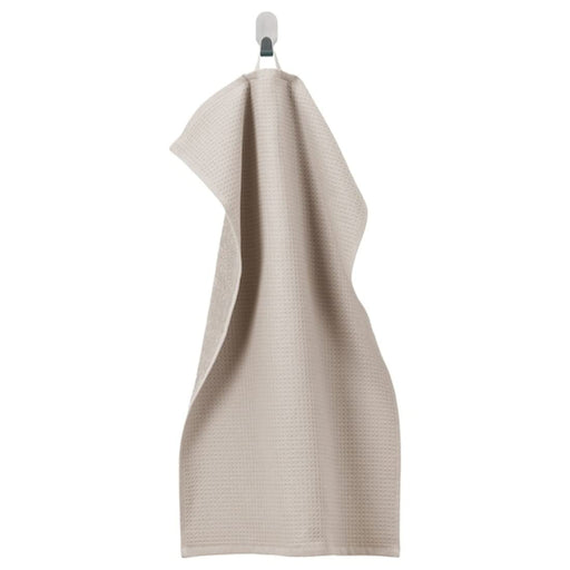 A Beige hand towel with a soft, smooth texture 30512886