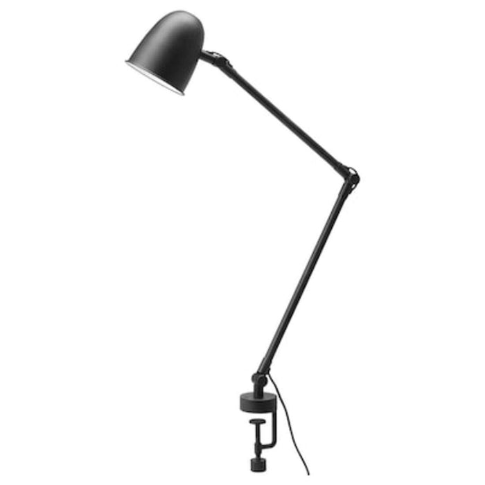 A black IKEA work/wall lamp with an adjustable arm and head, mounted on a white wall.-40326025