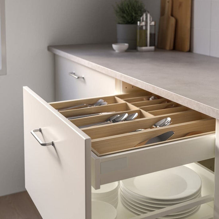 The IKEA light bamboo cutlery tray is a stylish and functional home storage solution for your kitchen.