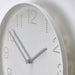 A modern and stylish wall clock with a minimalist design  60454291  