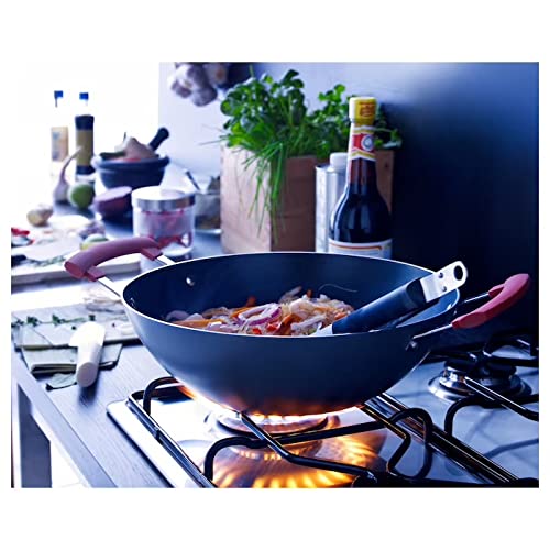 Wok being used to cook noodles with perfect texture 60203486