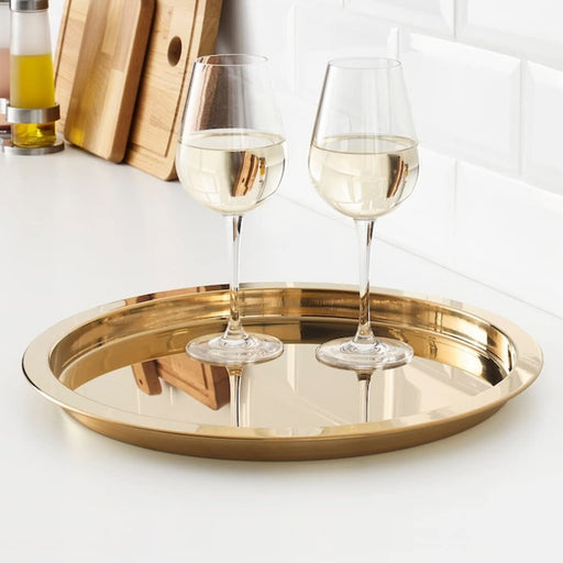 A round gold tray from Ikea, perfect for serving snacks or displaying decorative items.,38 cm (15 ") 50350114