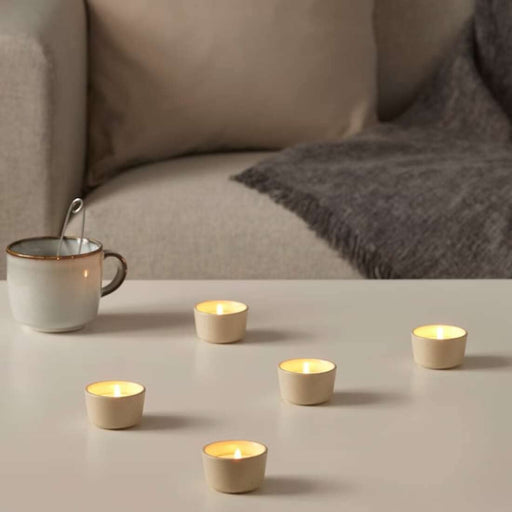 IKEA Bonfire Tealight: A small, scented candle with a warm and comforting bonfire scent, perfect for relaxation and stress relief.
