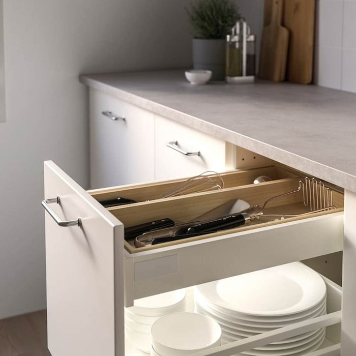 "An environmentally conscious home storage solution from IKEA - the light bamboo cutlery tray.