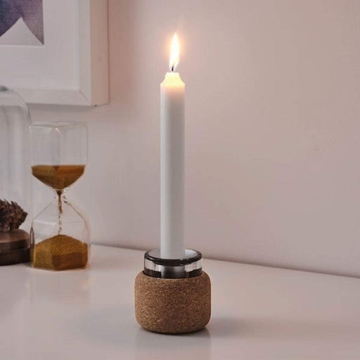 A tealight holder in a square shape, made of frosted glass with a on top for holding the tealight candle70454832