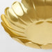 A decorative bowl in gold-color from IKEA, reflecting the light beautifully and adding a luxurious feel to any space  40524662