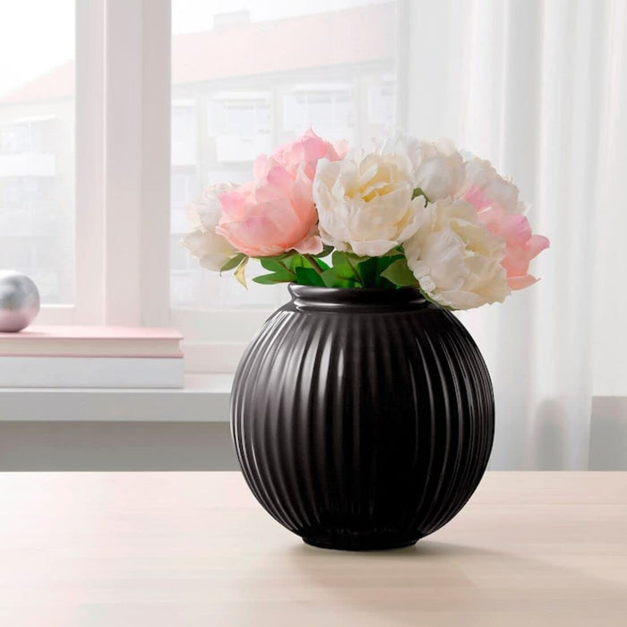 A decorative round vase from Ikea, filled with artificial flowers and perfect for low-maintenance home decor 40515993