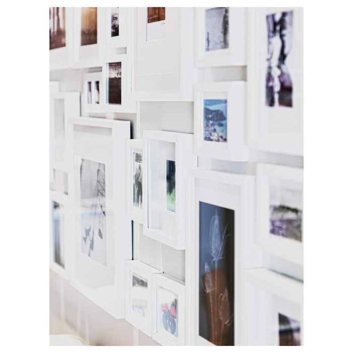Affordable white picture frame by IKEA, designed to showcase 21x30 cm art or photos. 60378400