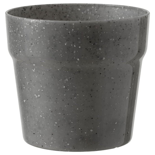 "A black plastic plant pot from IKEA, with a glossy finish and a cylindrical shape. It has no drainage holes and is suitable for indoor use."