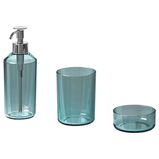 A clear glass soap dispenser, toothbrush holder, and storage jar arranged in a set 20483115