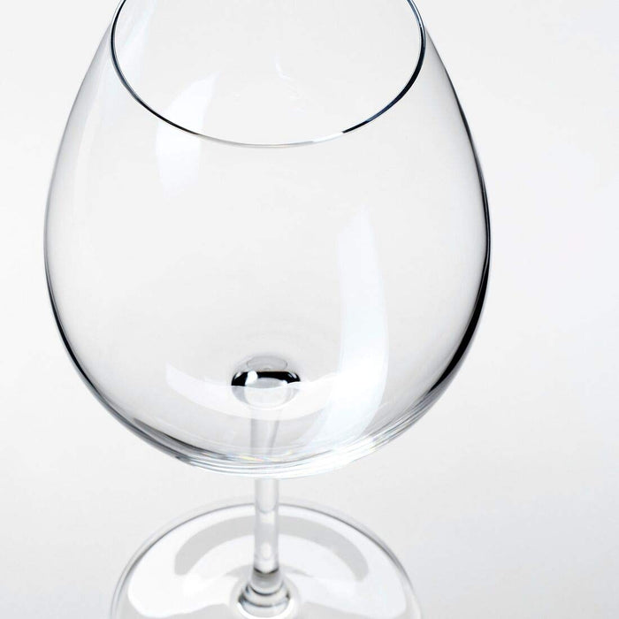 A sleek and elegant clear glass red wine glass with a stemmed design, ideal for enjoying a glass of red wine.