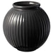 A modern black round vase from Ikea, made of matte-finished metal and perfect for creating a statement in any room 40515993