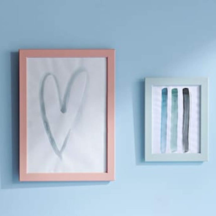 Create a charming and personalized display of your favorite photos and artwork with this light blue IKEA frame 90464712