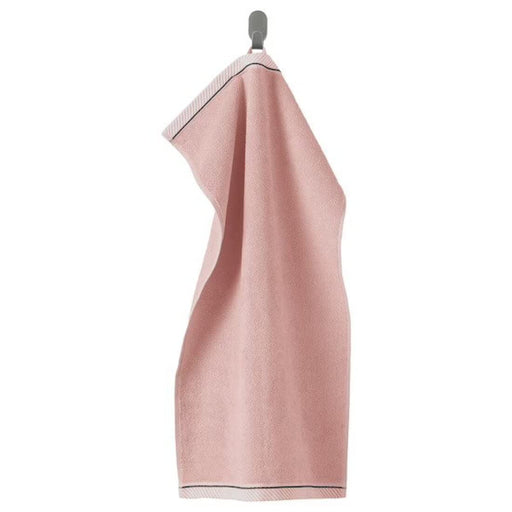 A pink hand towel with a soft, smooth texture 90475348   