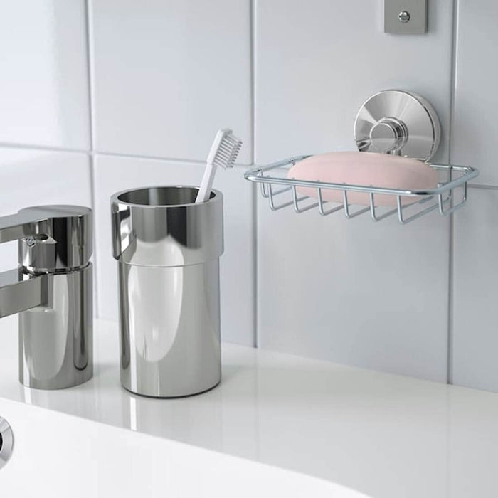 A sturdy and functional soap holder with a suction cup design, perfect for mounting on smooth surfaces 90463963