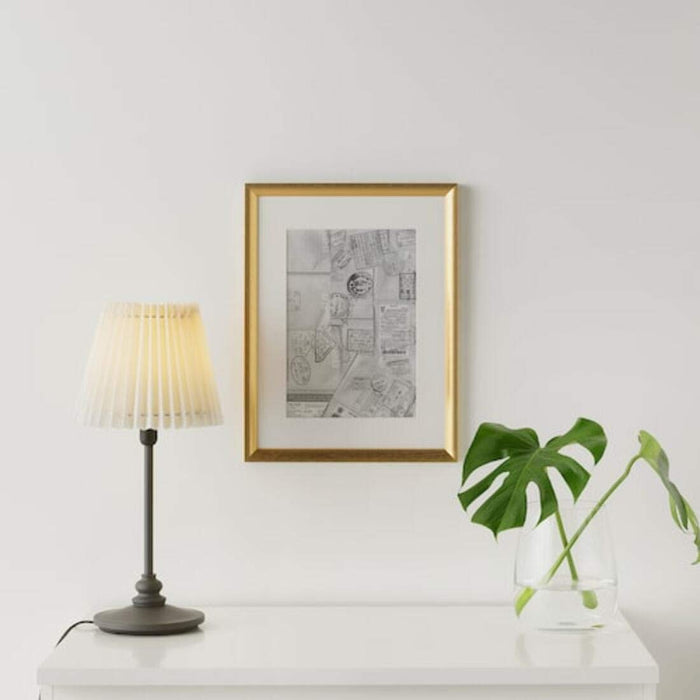 A beautiful gold frame from IKEA to elevate your wall decor game. 00370402