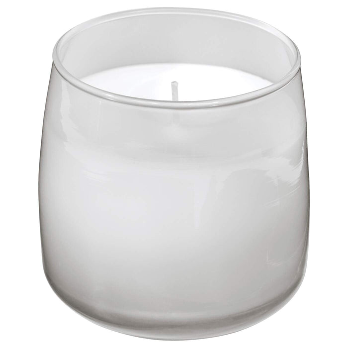 A decorative candle in a glass jar, adding a touch of style and personality to any living space.